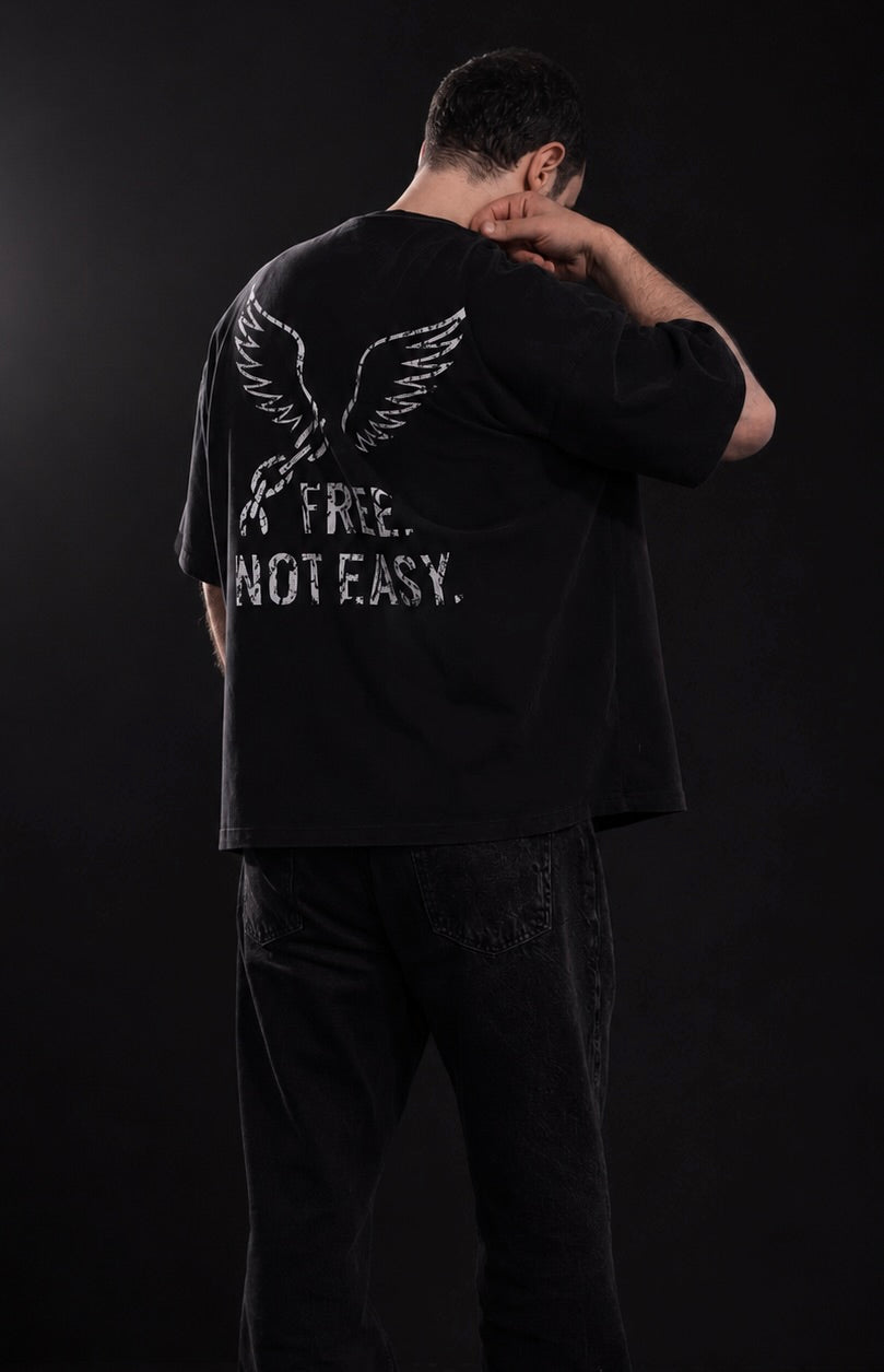 Free. Not Easy. T-Shirt